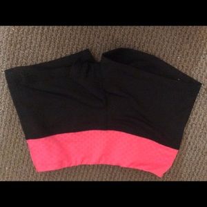 Pink and black spandex shorts